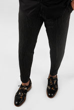 Black and white pinstripe trousers/pants