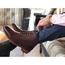 mens leather dark brown boots handmade from Spain with navy blue pants