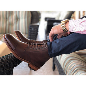mens leather dark brown boots handmade from Spain with navy blue pants